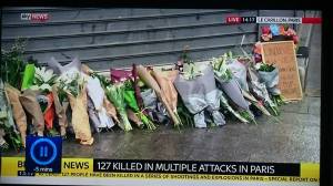 Flowers placed outside Le Carillon, Paris via Sky News. 